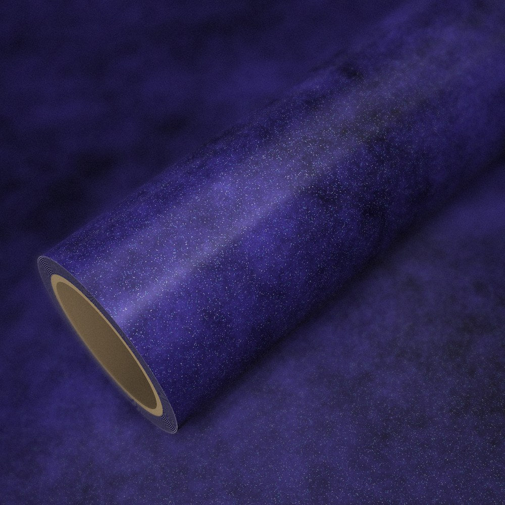 Rotolo di pellicola diamante blu viola su un foglio della stessa pellicola