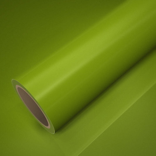 Rotolo di pellicola ICR® giallo verde fluo lucido su un foglio della stessa pellicola